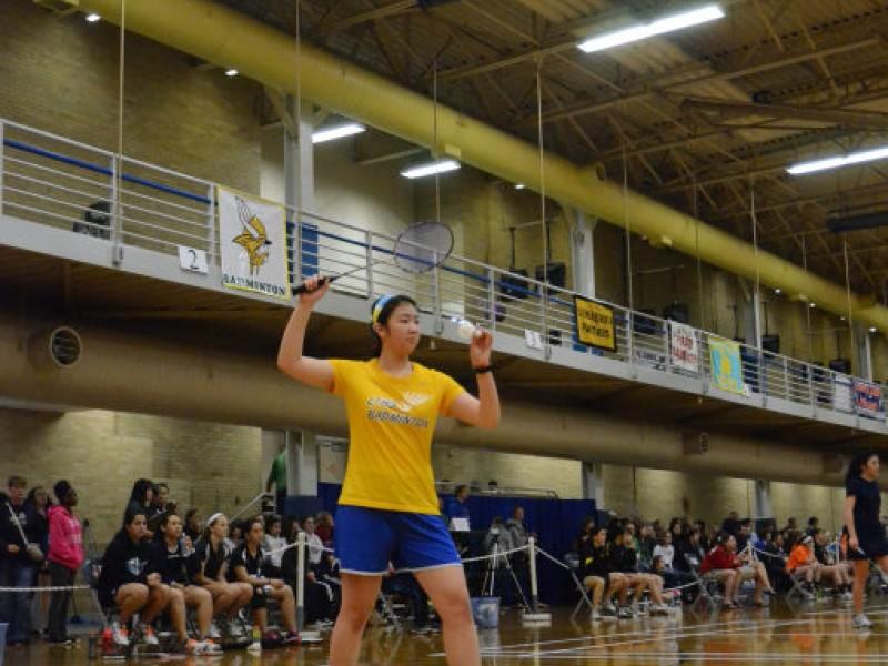 Reigning state champion Stephanie Lin '15 prepares to serve
