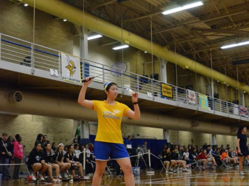 Reigning state champion Stephanie Lin 15 prepares to serve