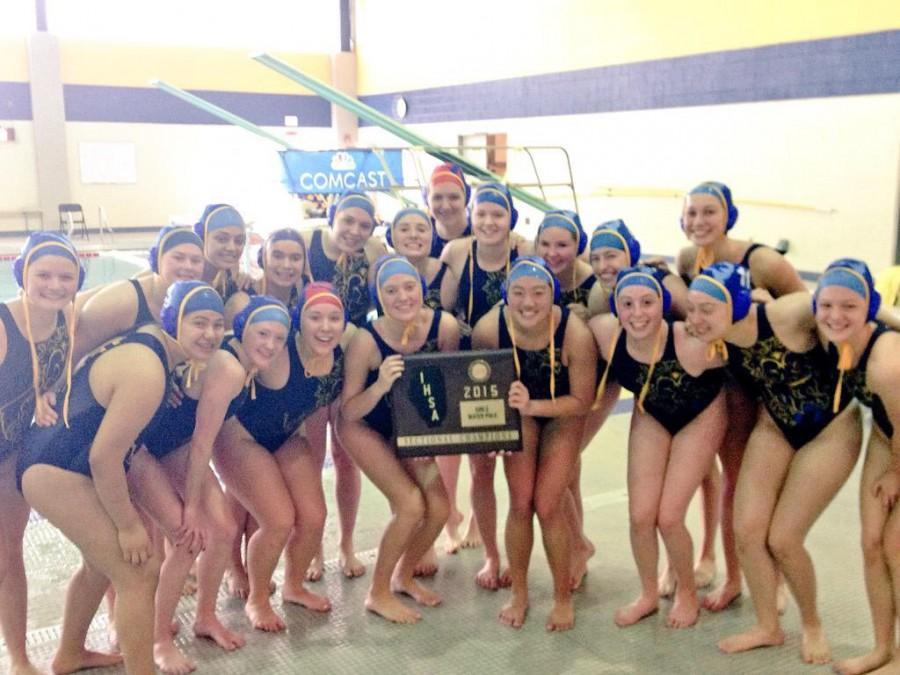 Girls water polo splashes on