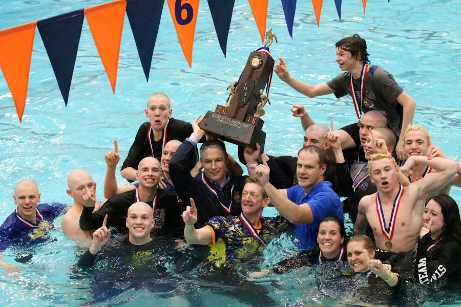 The team celebrates with the trophy (Chris Johnston).