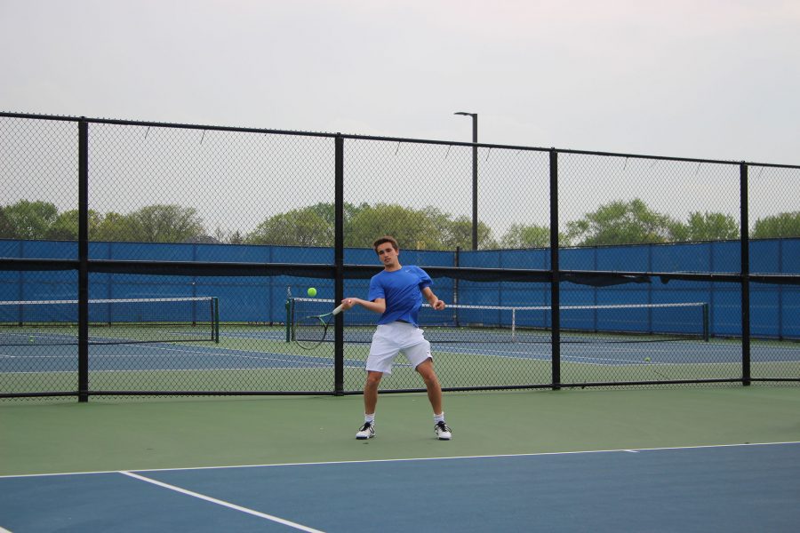 Jack+Bernstein+17+hits+a+forehand+shot.