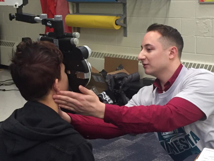 Student receives a free eye examination from the Eagles Eye Foundation Jan. 29. 