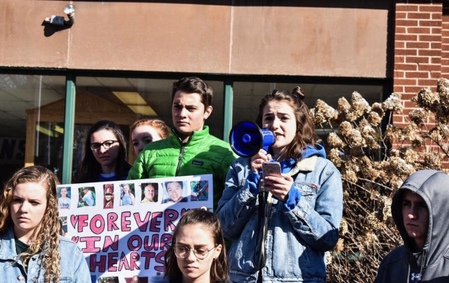 Students walk out in protest, respect for lives lost