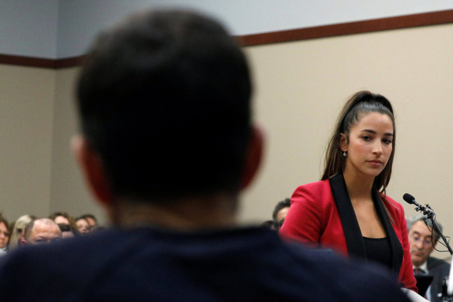 Victim and former gymnast Aly Raisman speaks at the sentencing hearing for Larry Nassar, (R) a former team USA Gymnastics doctor who pleaded guilty in November 2017 to sexual assault charges, in Lansing, Michigan, U.S., January 19, 2018. REUTERS/Brendan McDermid