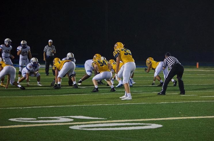 LT+Football+honors+seniors%2C+plays+Sandburg