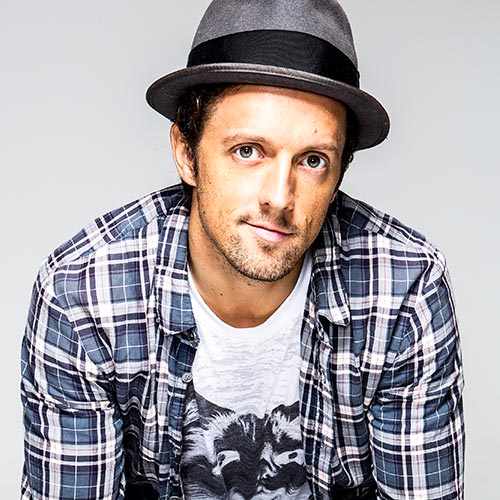 Jason Mraz posing for a promotional photo.