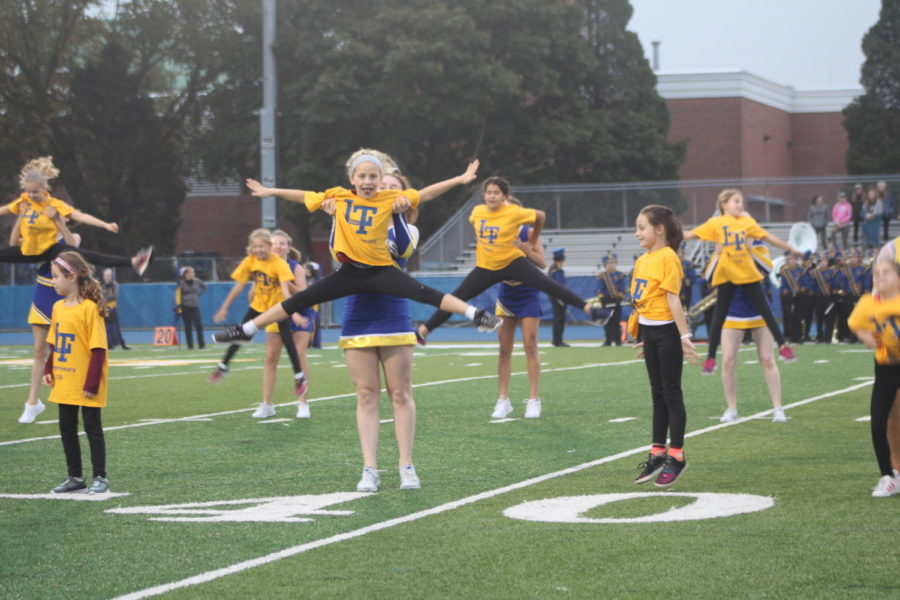 The LT Poms team performs with their younger partners (Sorice/LION).