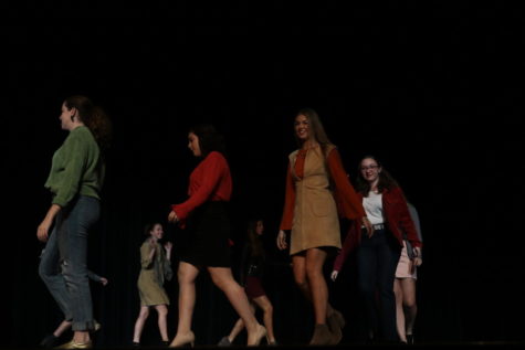 Models show off clothes in the Reber Center (Menna/TAB).