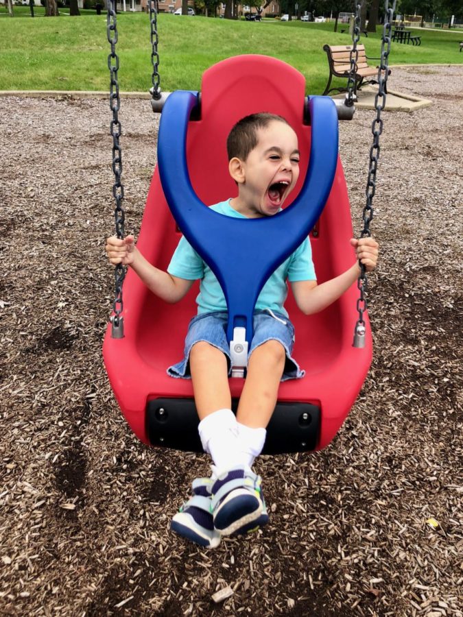 Parker Ramirez enjoys the new adaptive swing at Kiwanis park in Brookfield (Christine Ramirez).