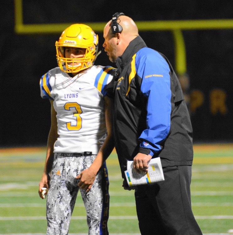 Kurt Weinberg and JJ Dutton 19 discussing plays during a games (Photo coutesy of Gazis).