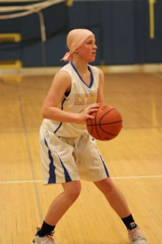 Despite being diagnosed with Hodgkins Lymphoma, Allie Kuhlman 22 continues to play basketball for LT.  (Photo provided by Megan Guzlas)
