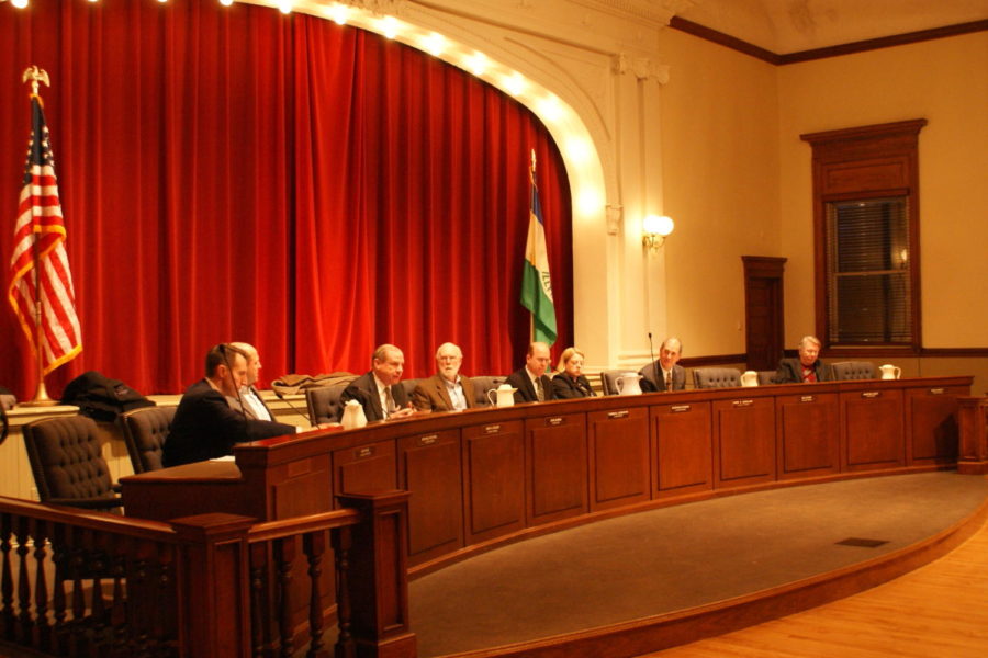 Village board members debate at the recent meeting (Shearrill/LION).