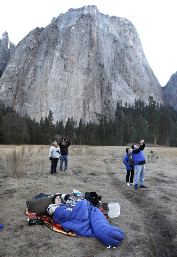 Onlookers watch climbers Kevin Jorgeson and Tommy Caldwell as they attempt to ascend the Dawn Wall of El Capitan on Jan. 13, 2015 in Yosemite National Park, Calif., which is the event on which the documentary is based (Patrick Tehan/Tribune News Service).