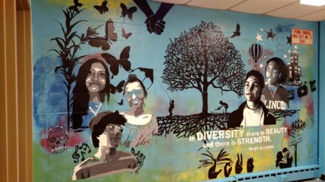 Transition Academy participants worked on the painting in B101 (photo courtesy of Jorge Sanchez).