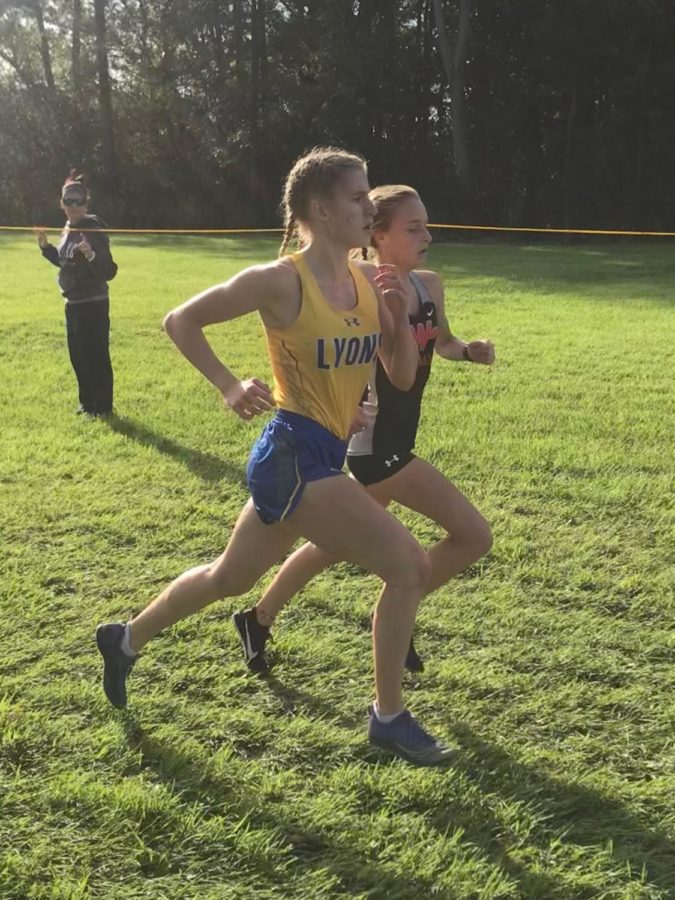 Maggie Abbs 20 passes competitor during race (courtesy of Don Abbs).  