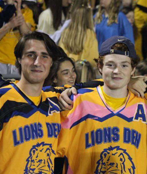 Ben Catrambone 20 (LEFT) and Ian Tawse 20 (RIGHT) posed for a photo during a home football game (photo courtesy of Jack Kapp 20).  