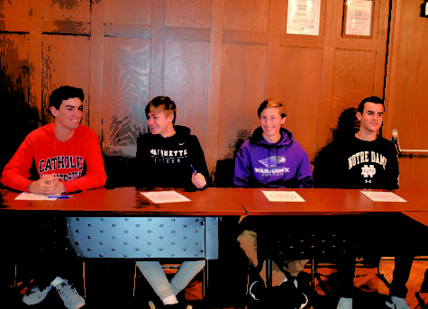 Student-athletes commit to college programs