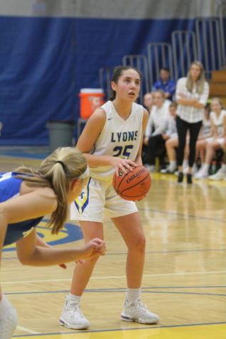 Hailey Markworth 22 shoots a freethrow during the tournament game against Wheaton North on Nov. 30 (Sorice/LION).