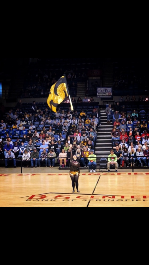 Kaila Baker 20 preforms her solo routine at the Illinois Drill Team Association state finals on Feb. 15 (photo courtesy of Baker). Her dance routine placed second at the competition.