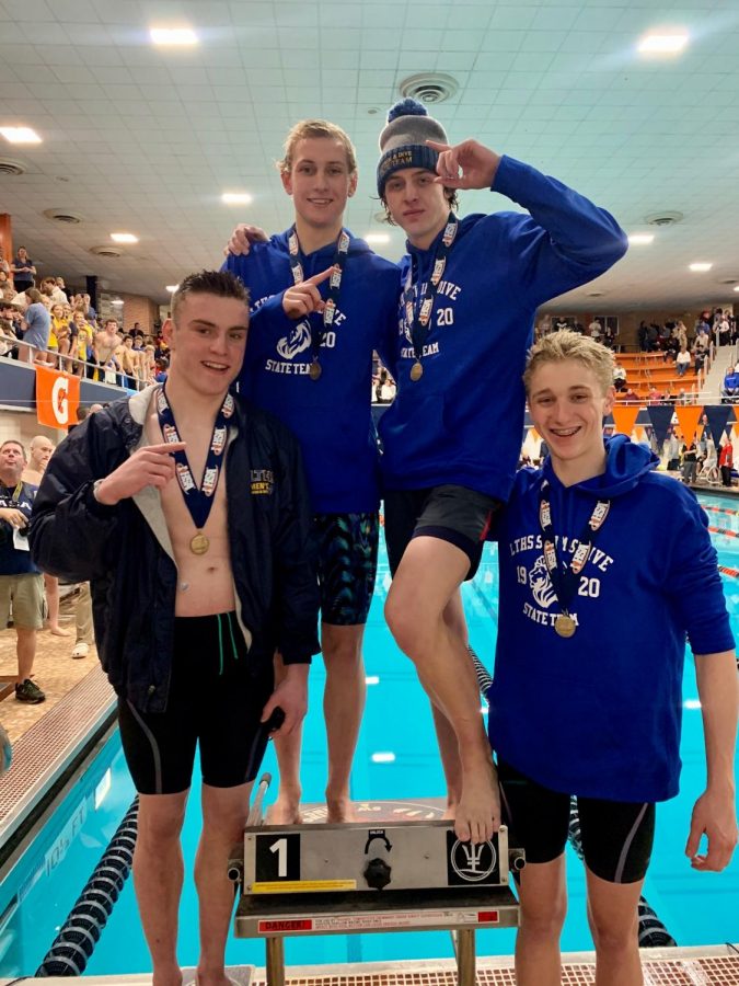 Jack Thorell 20, Bryson Breitenbucher ‘20, Michael Schoneman ‘21, and Jack Wanless ‘22 with their medal.