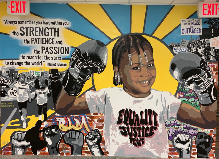 Diversity+mural+located+at++Lyons+Township+north+campus.+Photo+by+Janessa+Mosqueda+%E2%80%9822