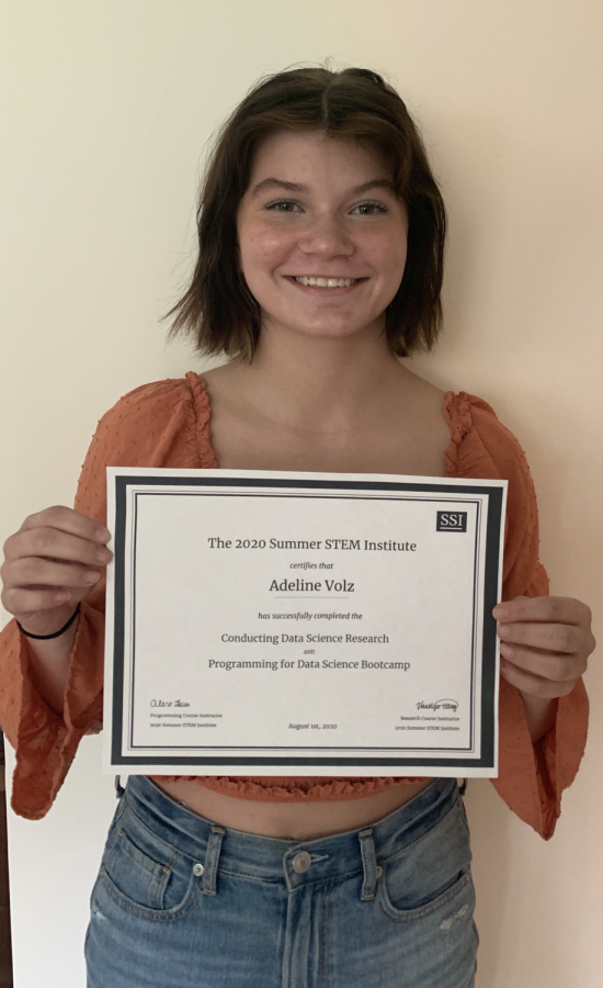 Addy Volz holding her summer STEM certificate
(Lindsey Volz)