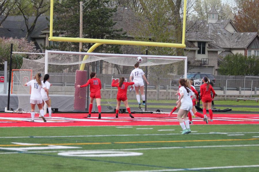 Lily Mattern 21 #17 looks to connect a cross onto frame (photo courtesy of Mattern).