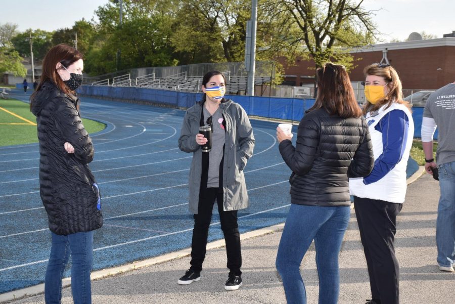 Principal Tyrrell meets LT faculty and staff at the Wellness Walk before school on Friday May 7 (photos by Randy Antlept). 