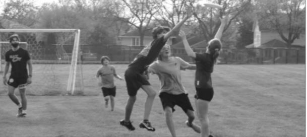 Three players jump and compete to catch a pass during a Tuesday practice at the fields behind the Corral (Ferrel/LION).