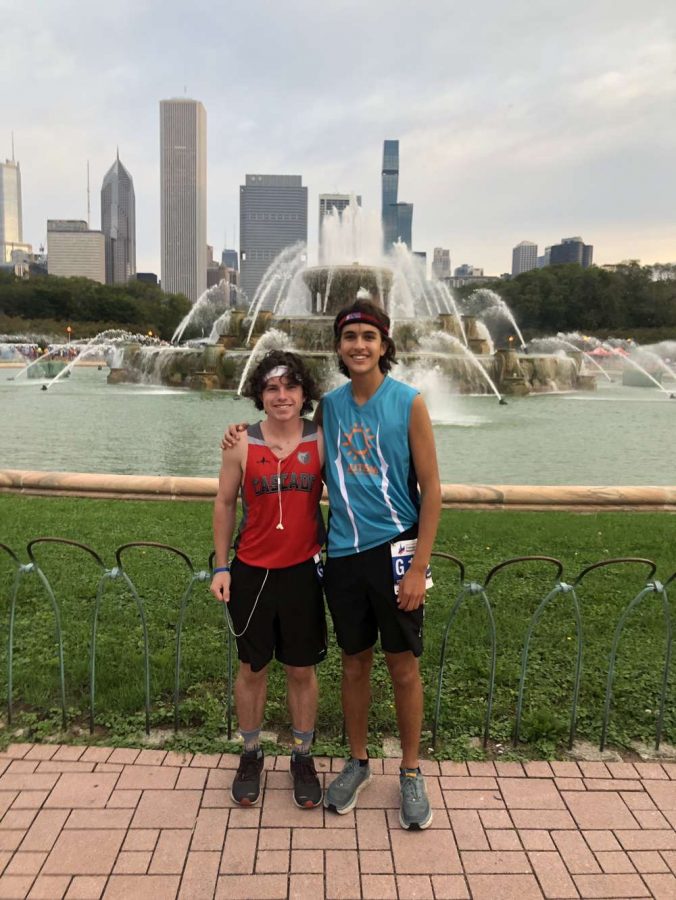 Tiernan Kelly '22 and Kyle Mora '22 pose after running the Chicago Marathon (photo courtesy of Mora).