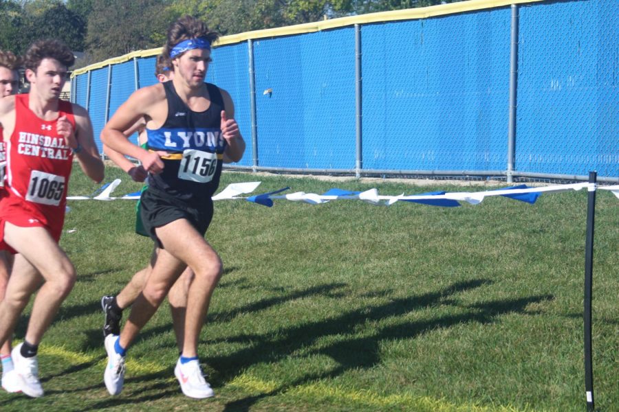 Charlie McLawhorn '22 runs at conference meet at LT's home (Chomko/LION).