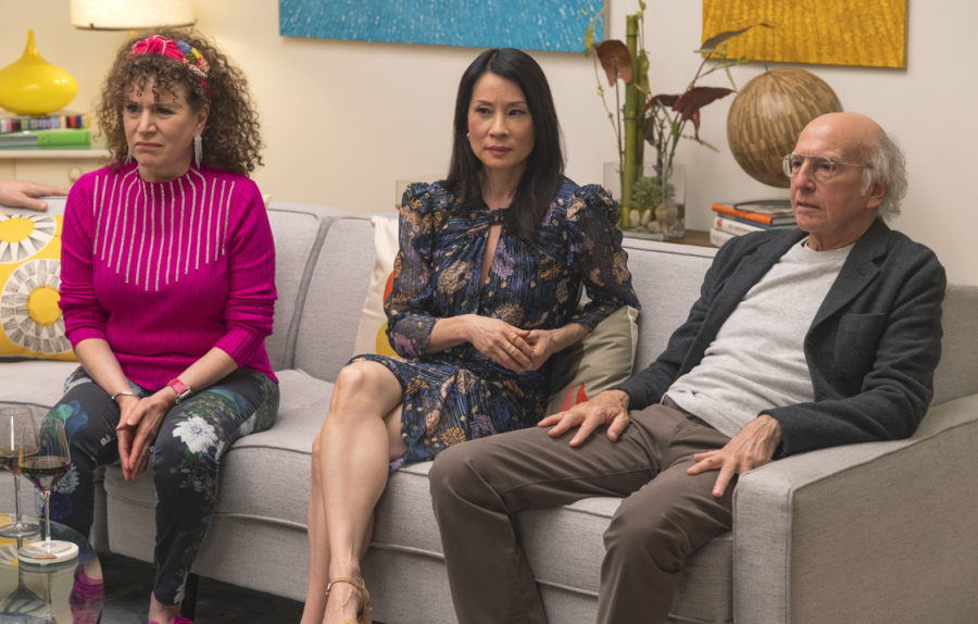 Left to right: Susie Esseman as Susie Greene, Lucy Liu as herself, and Larry David as Larry David at a party with the typical companions of the show (out of shot) (photo courtesy of Tribune News Service). 