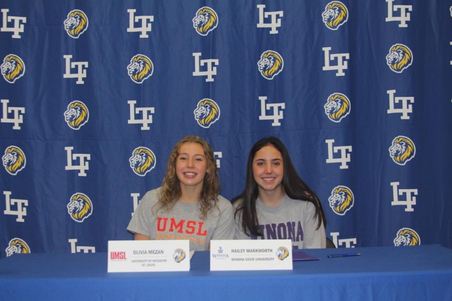 Olivia Mezan '22 and Hailey Markworth '22 attend Fall 2021 Signing Day on Nov. 10 (Wolf/LION).