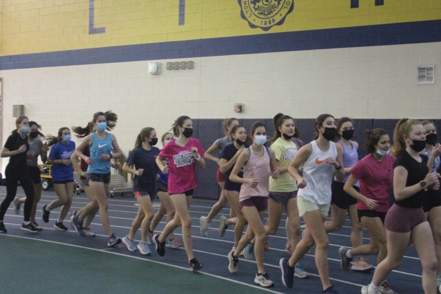 Girls short distance track runs at an indoor practice in the SC Fieldhouse on Wednesday, Jan. 26 (Simek/LION). 