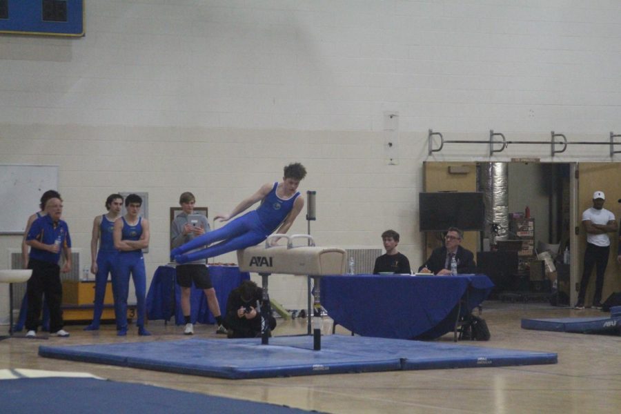 Boys gymnastics starts strong, breaks school record