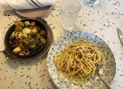 Bucatini Carbonara and Roasted Brussels Sprouts served at Il Mio (Gee/LION).