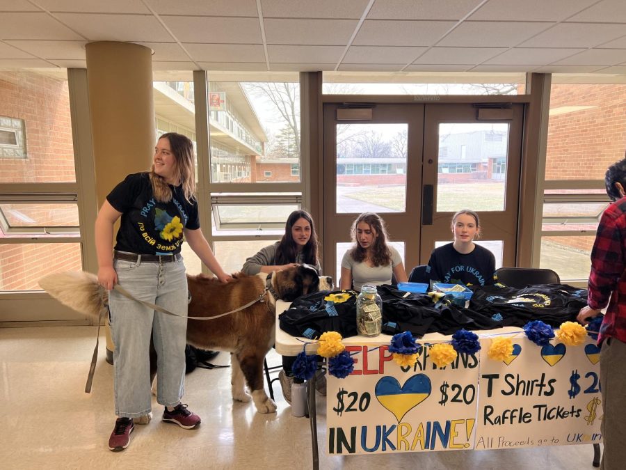PSI members at SC sell Ukraine T-shirts for $20 each during lunch periods (photo courtesy of Penelope Cornell).