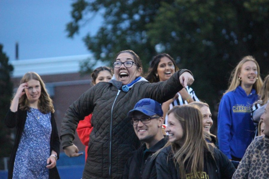 Principle Dr. Jennifer Tyrell cheers in excitement during the staff only musical chairs game (Ross/LION). 