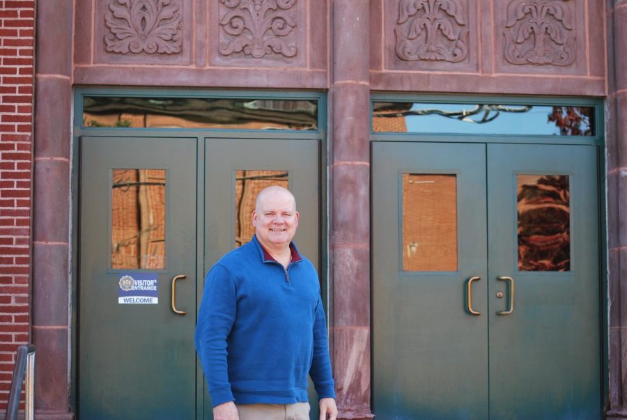 Kevin Brown stands outside of the clocktower doors (Kowalski/LION).