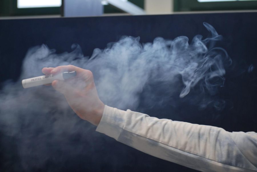 Depiction of a student vaping in a NC bathroom (Barbera/LION).