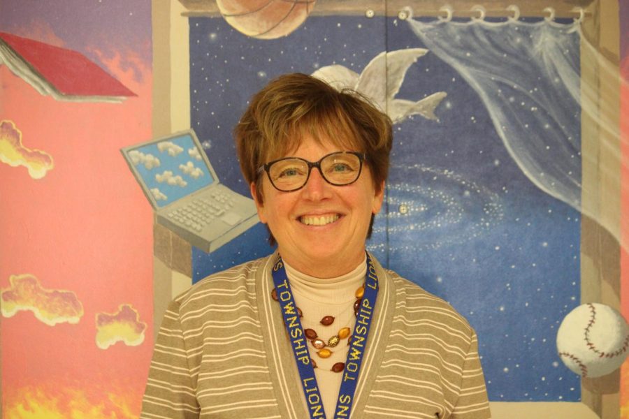 Vita Plena Award recipient Mary Alice Gamble poses outside of the NC office in room 110, the Curriculum and Instruction office (Mardegan/LION).