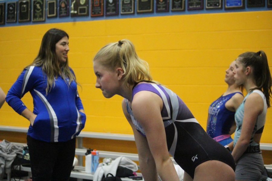 Annmarie Holmes ‘23 focuses on her next move on the mat at practice on Nov. 16 in the NC gymnastics gym (Lazich/LION).
