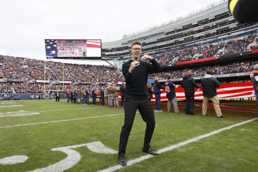 Krystle Conrad signs the National Anthem at Soldier Field on Nov. 13 (photo courtesy of Conrad) 