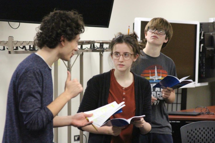 From left: Djordje Negovanovic 24, Natalie Halm 24, and Cooper Brown 25 practice show dialogue after school on Nov. 17 (Ross/LION)