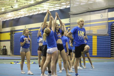 Competitive cheer team practices block routine at SC field house Nov. 21 for competition. (LION/Gartner).