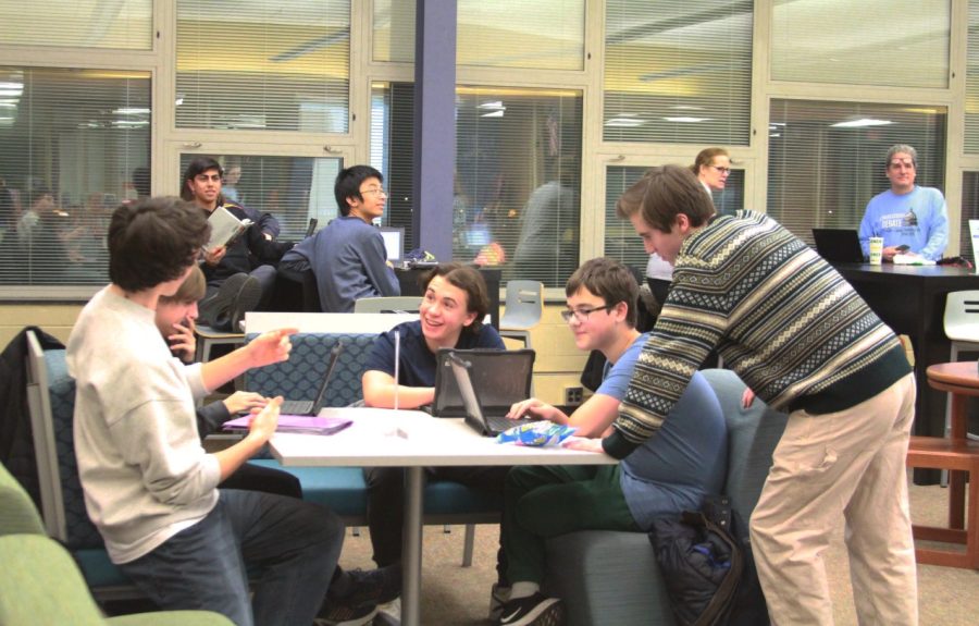 Debate members discuss their research, and prepare for upcoming debate competition at practice on Jan. 24 at SC library (Pohl/LION). 