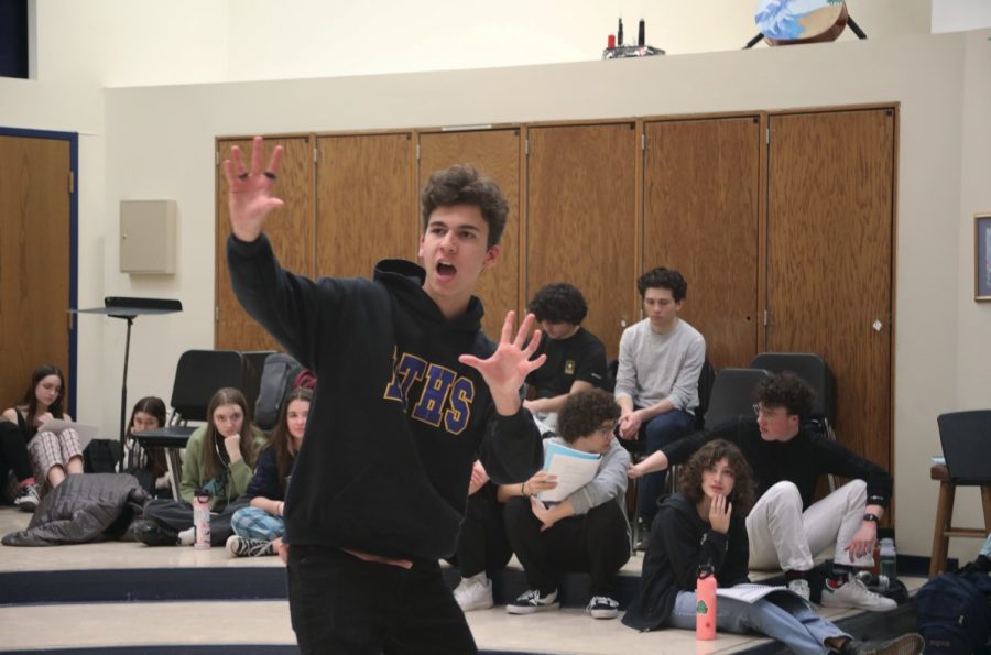 Logan Baffico ‘24 rehearses for upcoming musical, ‘Fiddler on the Roof,’ in front of Sunrise cast on Feb. 2 (Garrity/LION). 