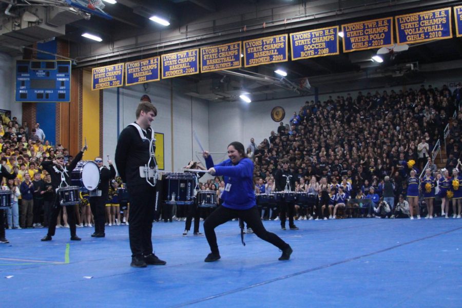 Principal+Jen+Tyrrell+plays+Taft+Szyperskis+23+drums+at+the+All-School+Assembly+during+the+drumline+performance+amid+thousands+of+students+%28Wolf%2FLION%29.