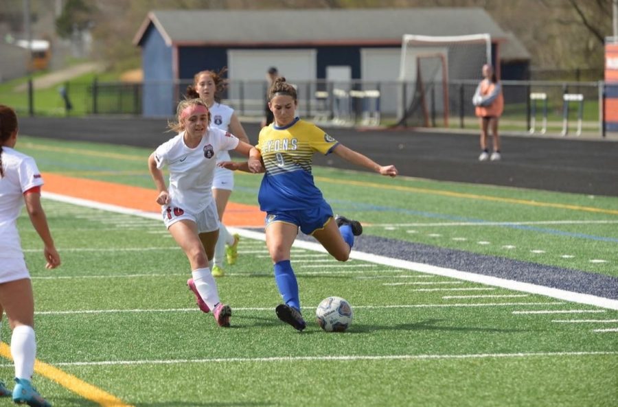 Katie OMalley 23 goes for a shot in game against Naperville North High School on April 3, 2022 (photo courtesy of OMalley)