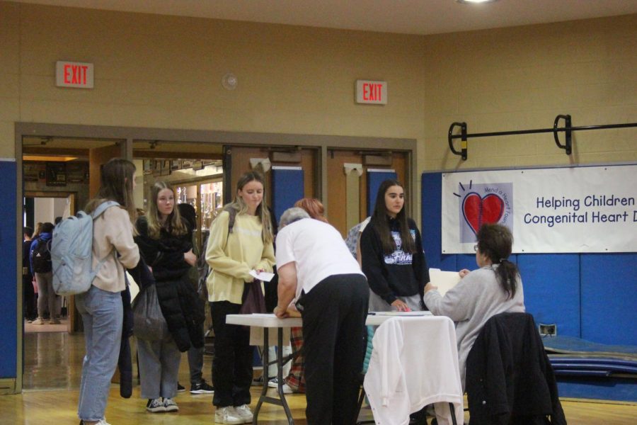 Students check in at NC Vaughan gym to get an ECG heart screening on May 2 (Gee/LION). 
